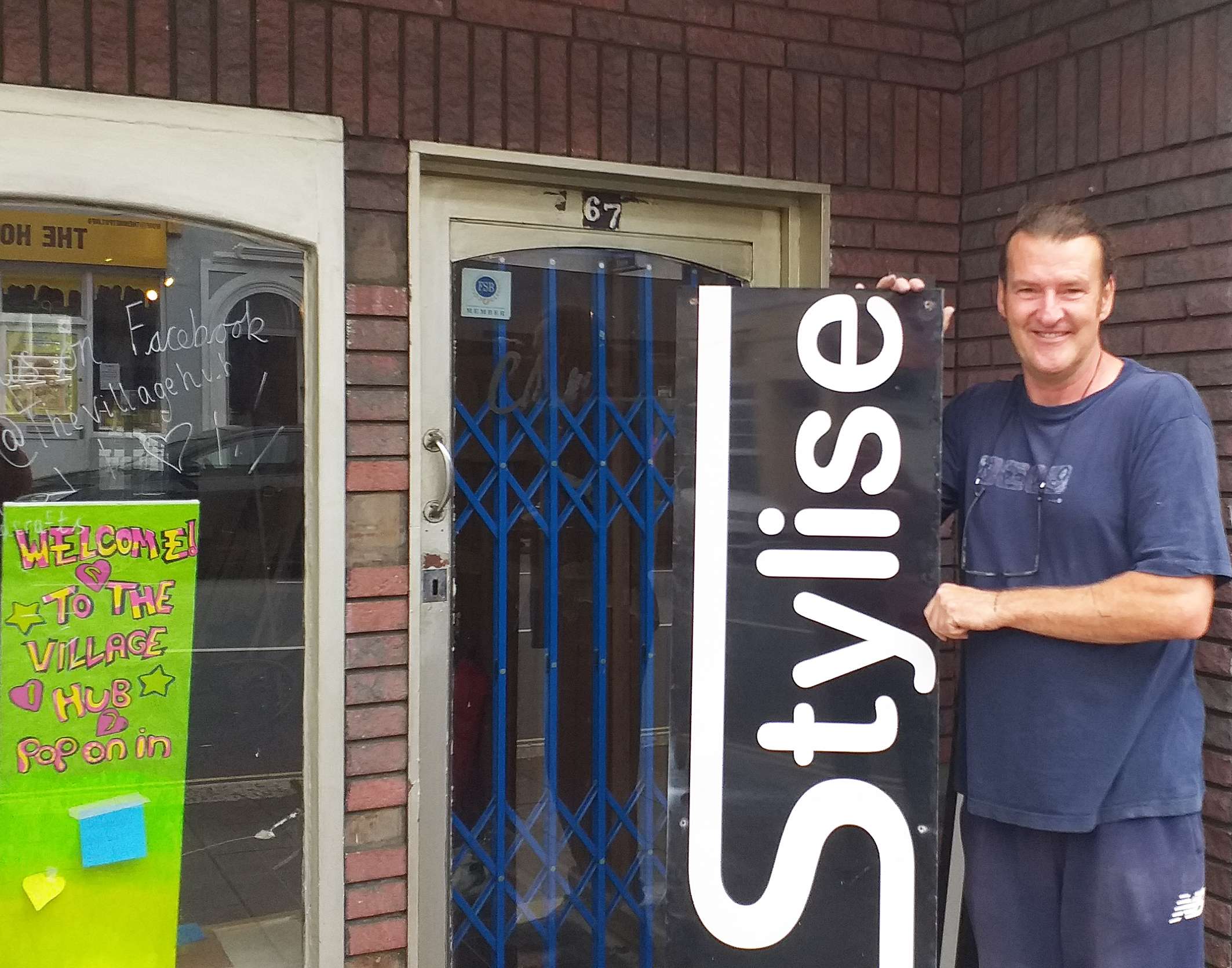 The Hub clive and old sign